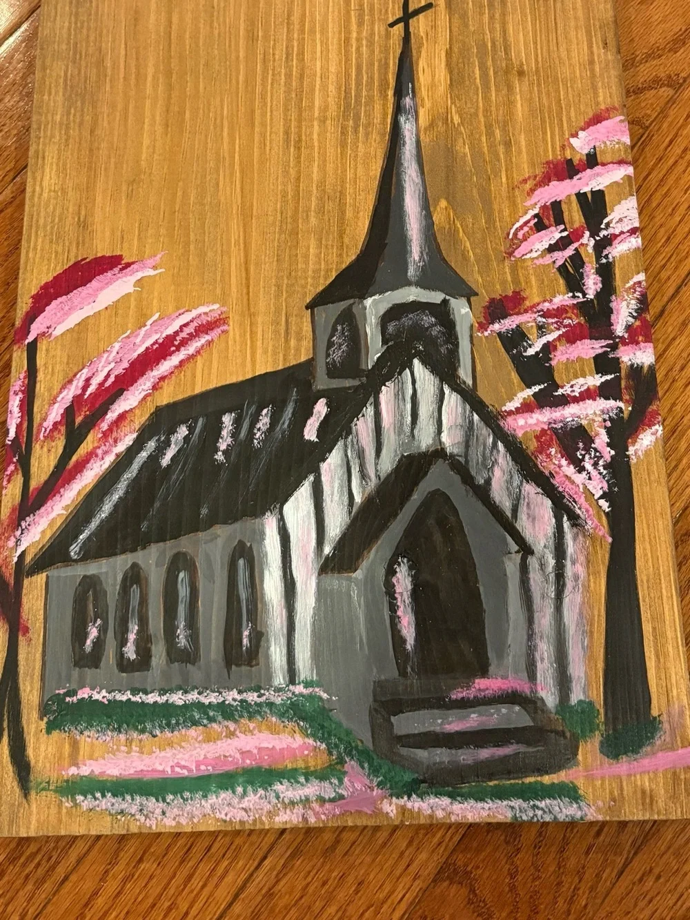 Hand-Painted wooden sign featuring a country church and the word “Chosen”